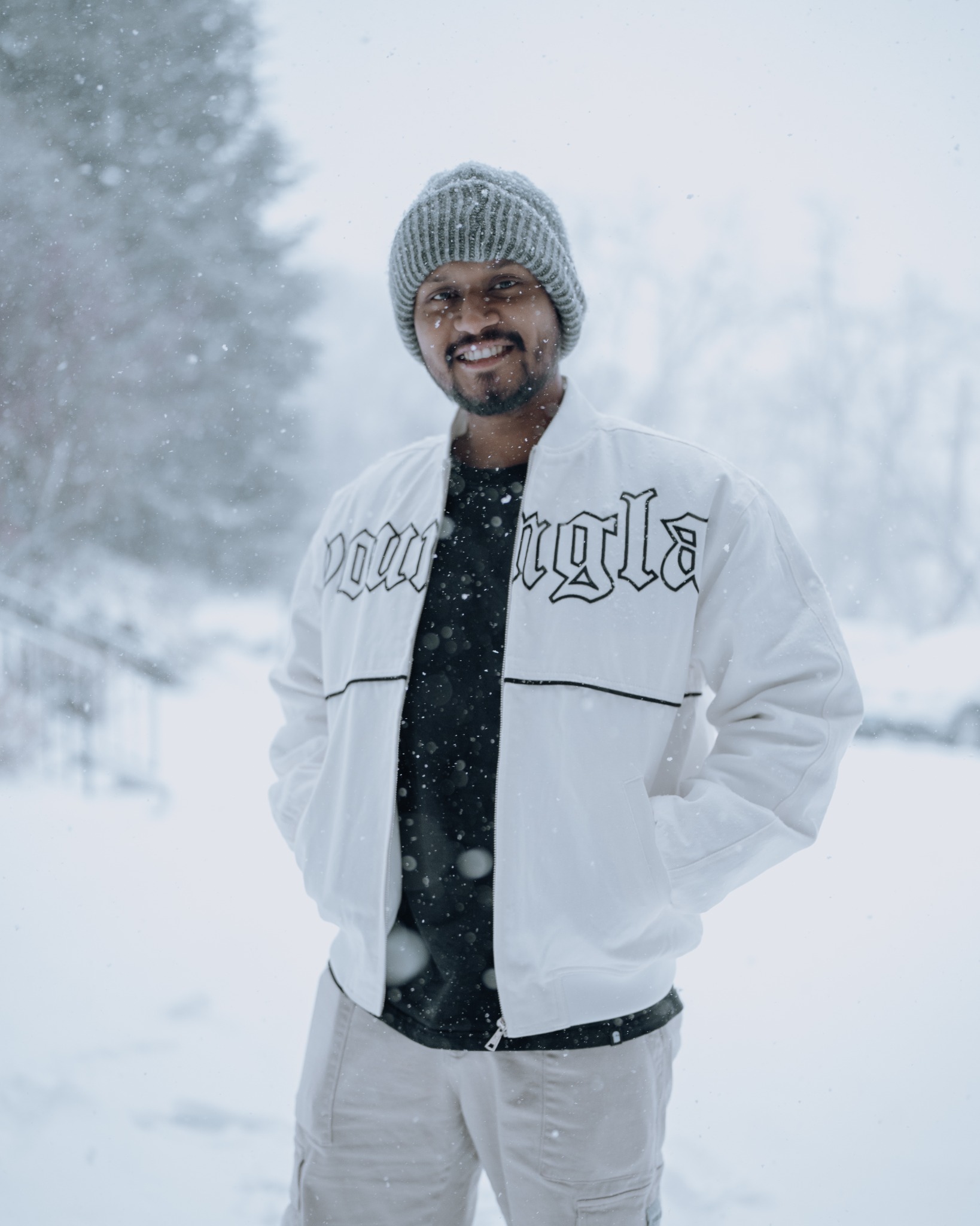 Ripan smiling during snowfall